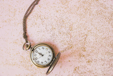 pocket-watch-with-sequins-table_23-2147992830